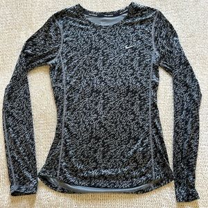 Nike running dri-fit women’s long sleeve fitted shirt. Size women’s XS.